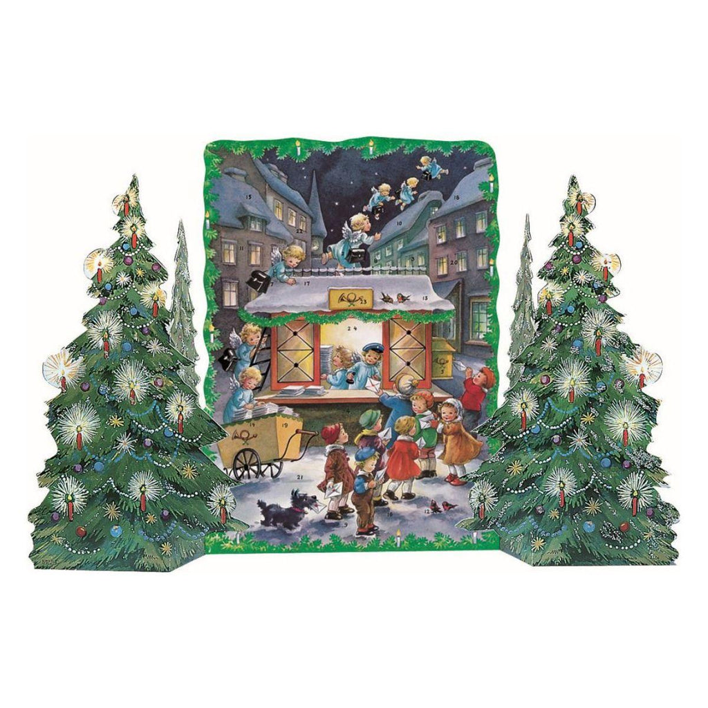 Decorative Christmas scene with trees and a village scene on a white background