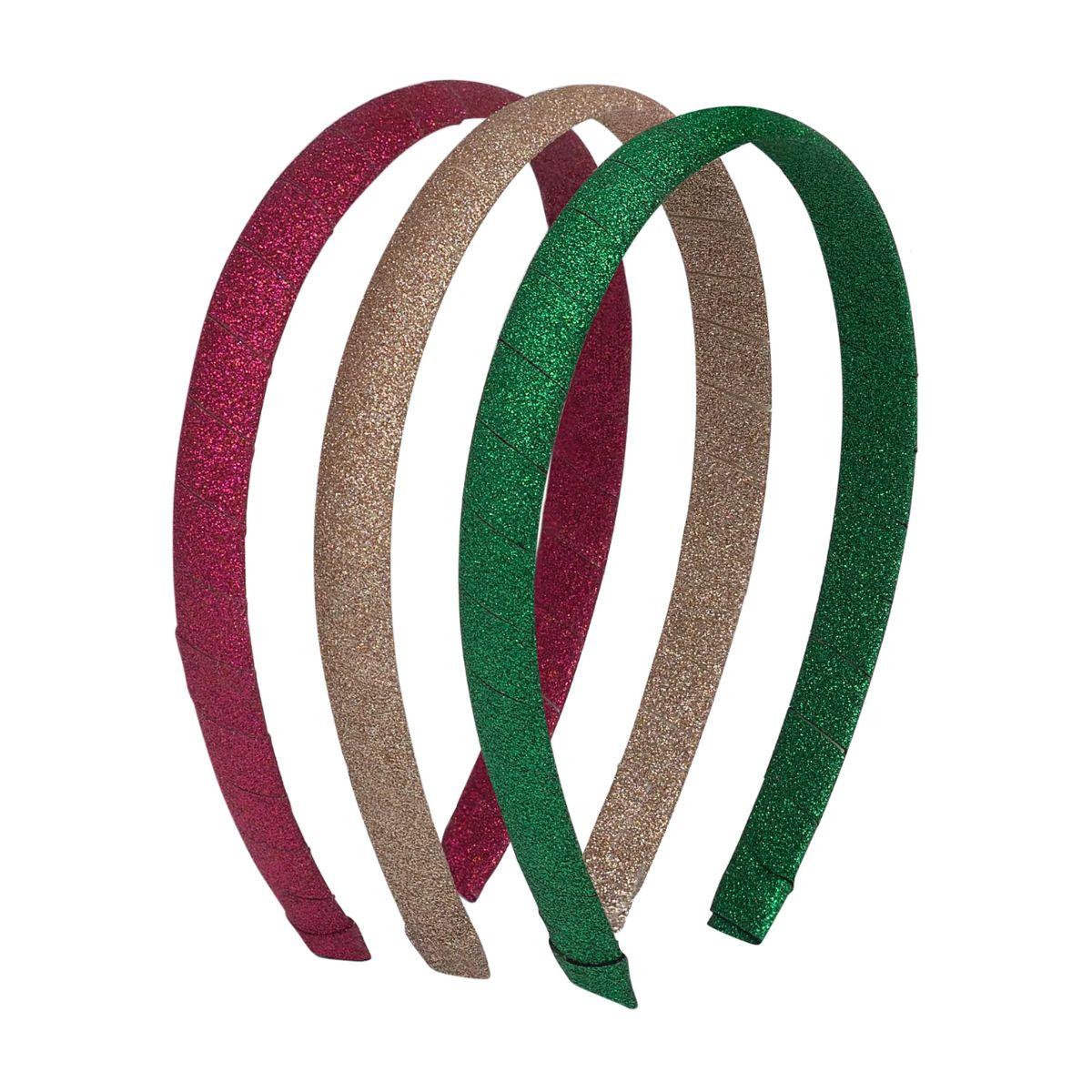 Four glittery headbands in red, gold, and green on a white background
