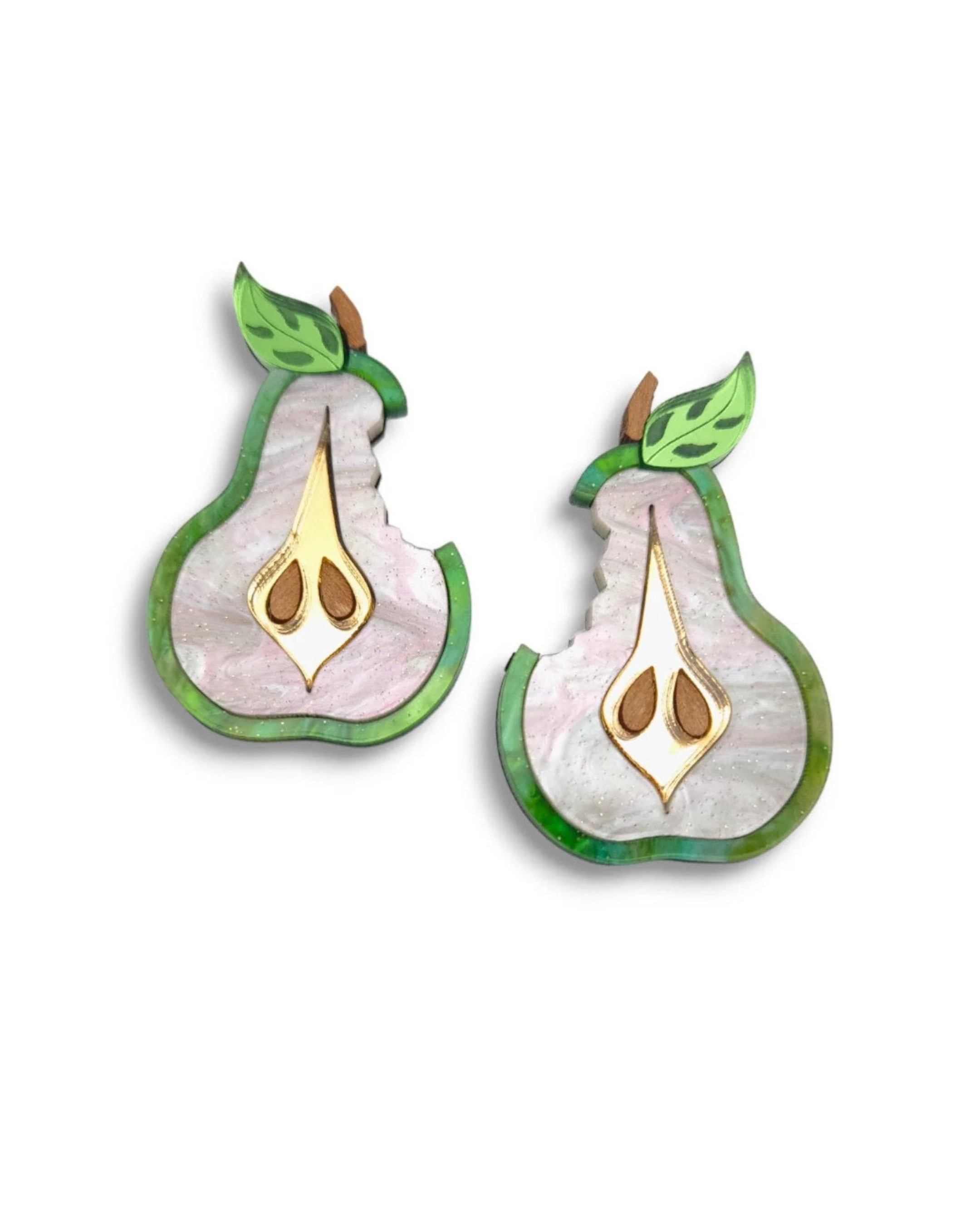 Pear-shaped earrings with green leaves on a white background
