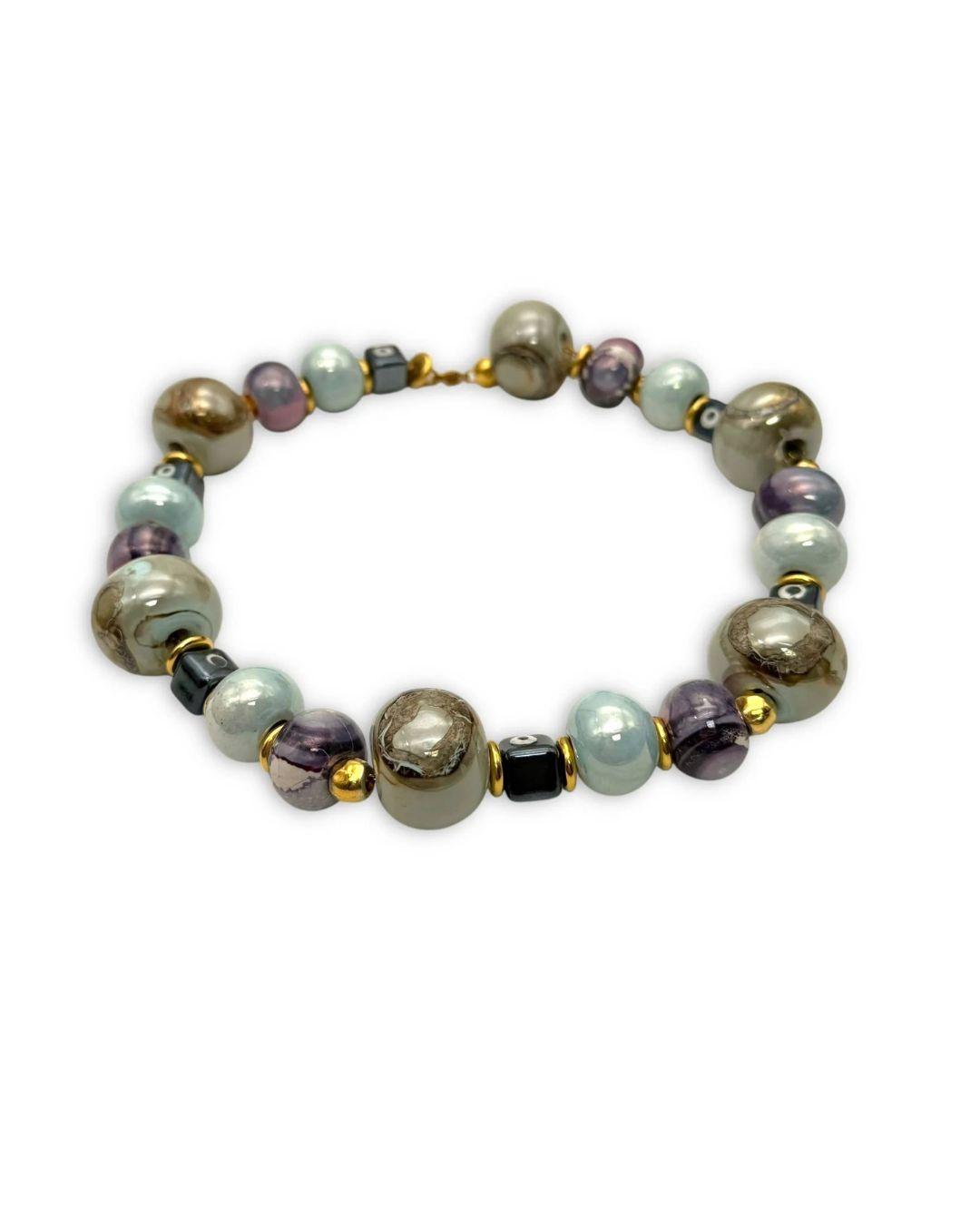 Multicolored beaded necklace on a white background