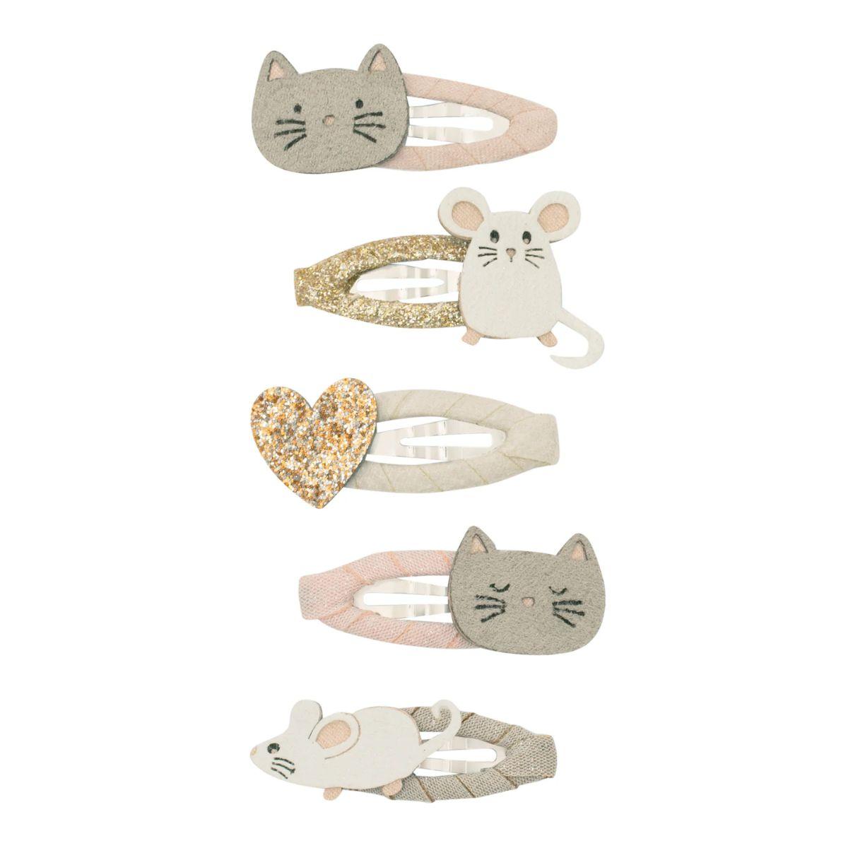 Set of five animal-themed hair clips on a white background