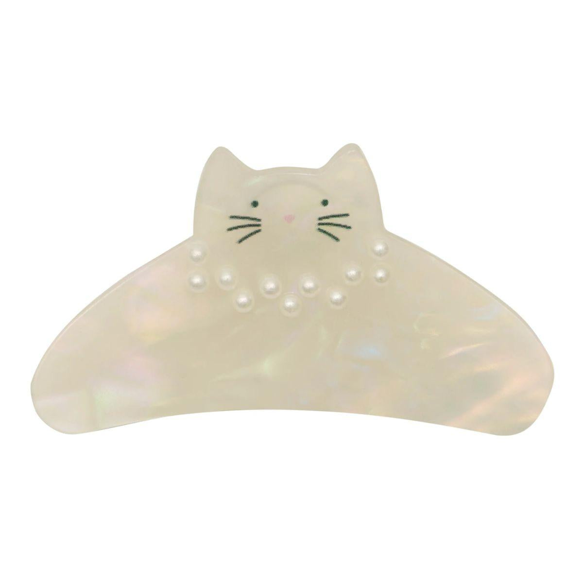 Cat-shaped night light with a white glow on a white background