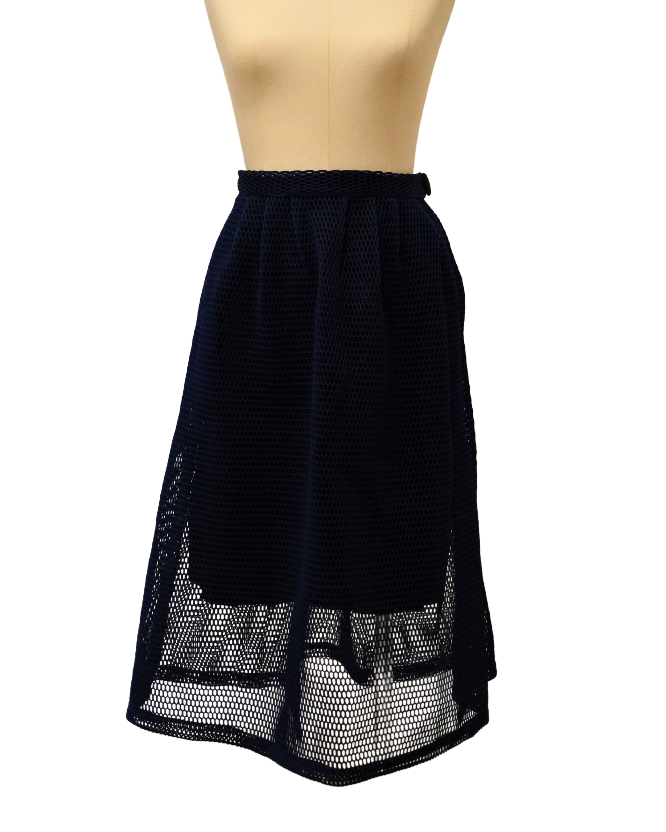 Black skirt with mesh overlay on a mannequin against a white background