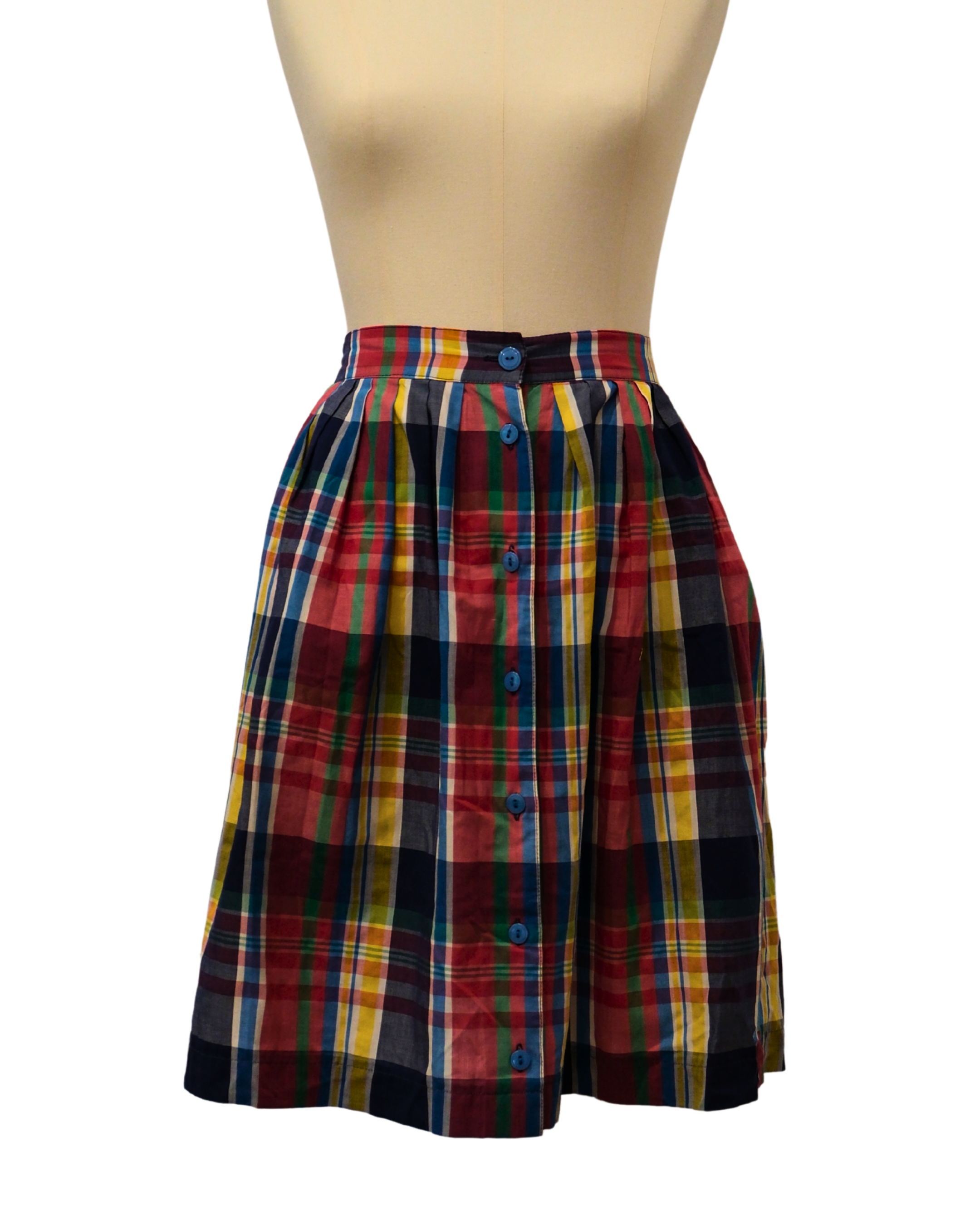 Colorful plaid skirt on a mannequin against a white background