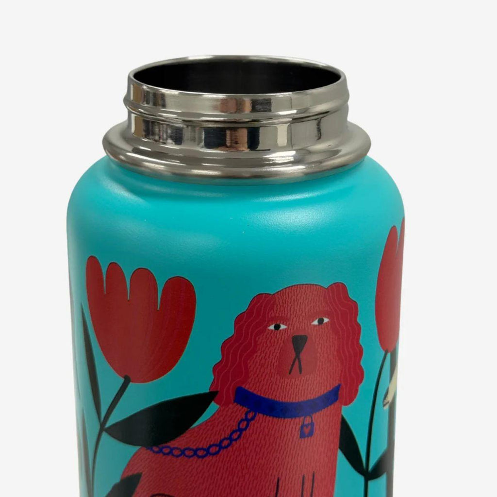 Turquoise water bottle with red dog and flower design on a white background