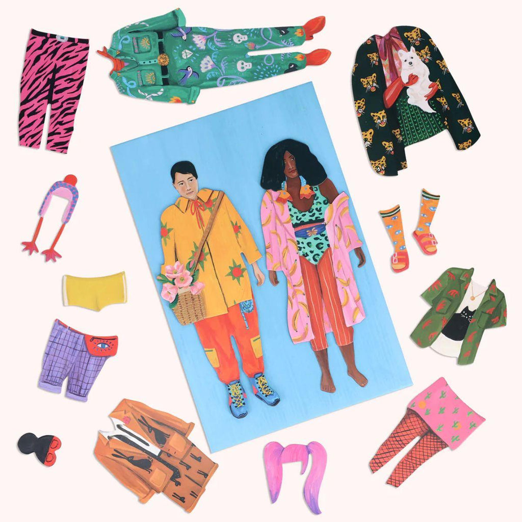 Colorful paper dolls with accessories on a white background