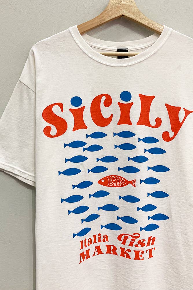 White t-shirt with 'Sicily Italia Fish Market' design featuring blue fish and red text on a hanger.